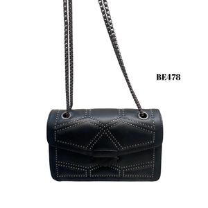 Bolso negro apliques plomo