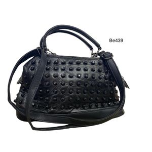 Bolso negro apliques negros