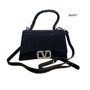 Bolso negro apliques plateado brillantes