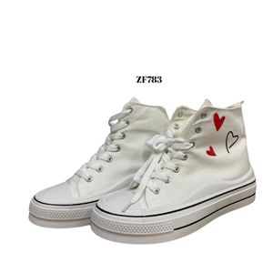 Tenis blanco detalles corazon