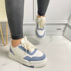 Tenis blanco detalle denim suela