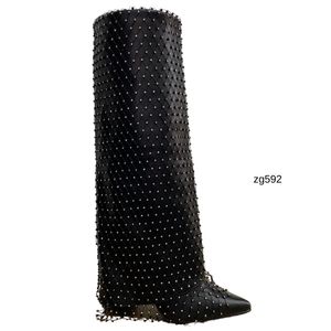 Bota caña alta negro doblez detalle malla apliques brillantes tacon