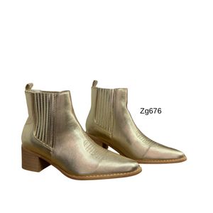 Botin texano dorado resorte tacon